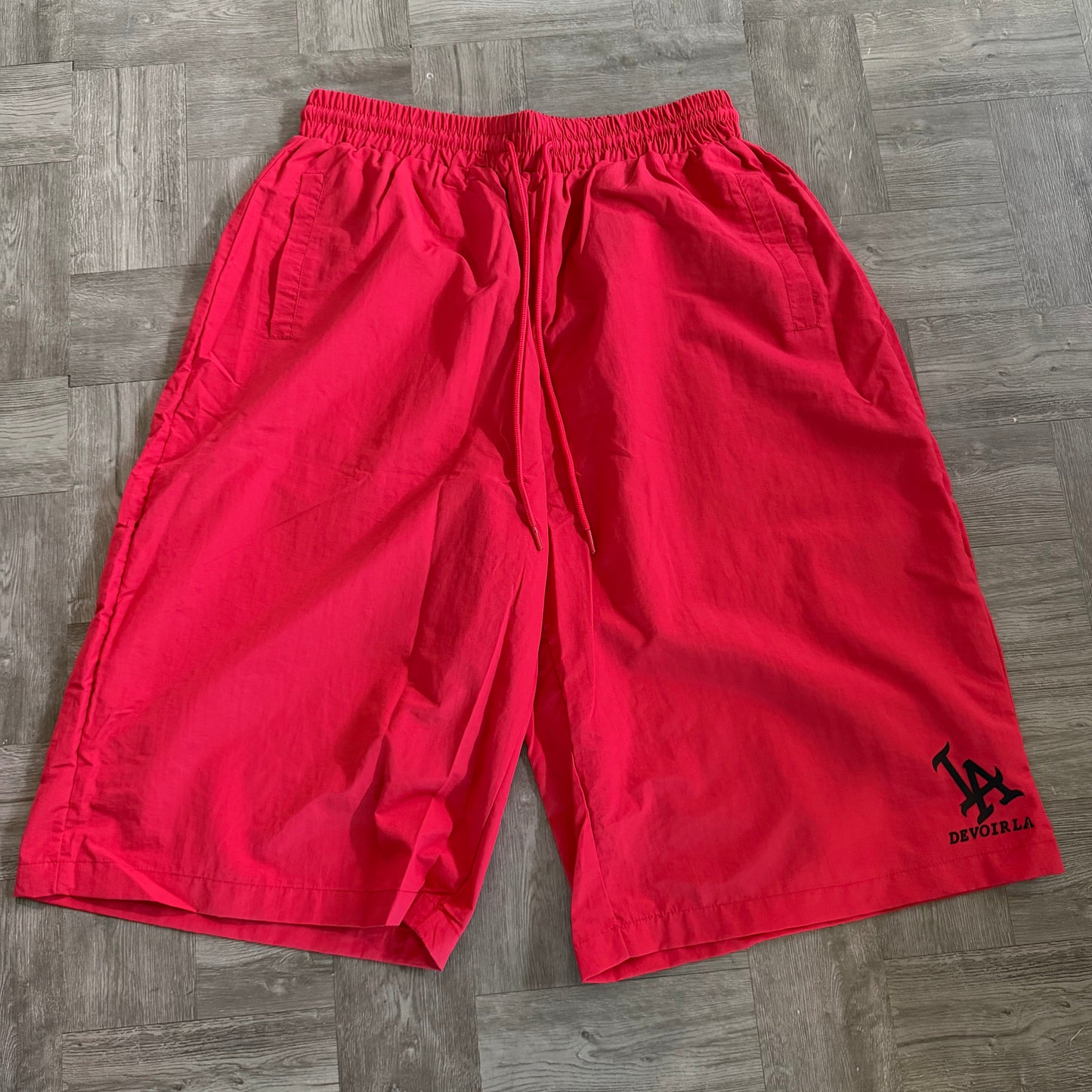 RED BAGGY NYLON SHORTS